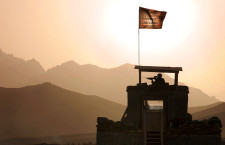 U.S. Army Spc. Zackery Cely provides security from a tower at Forward Operating Base Lane in the Zabul province of Afghanistan Oct. 5, 2009. Cely is from Alpha Company, 1st Battalion, 4th Infantry Regiment. (DoD photo by Spc. Tia P. Sokimson, U.S. Army/Released)